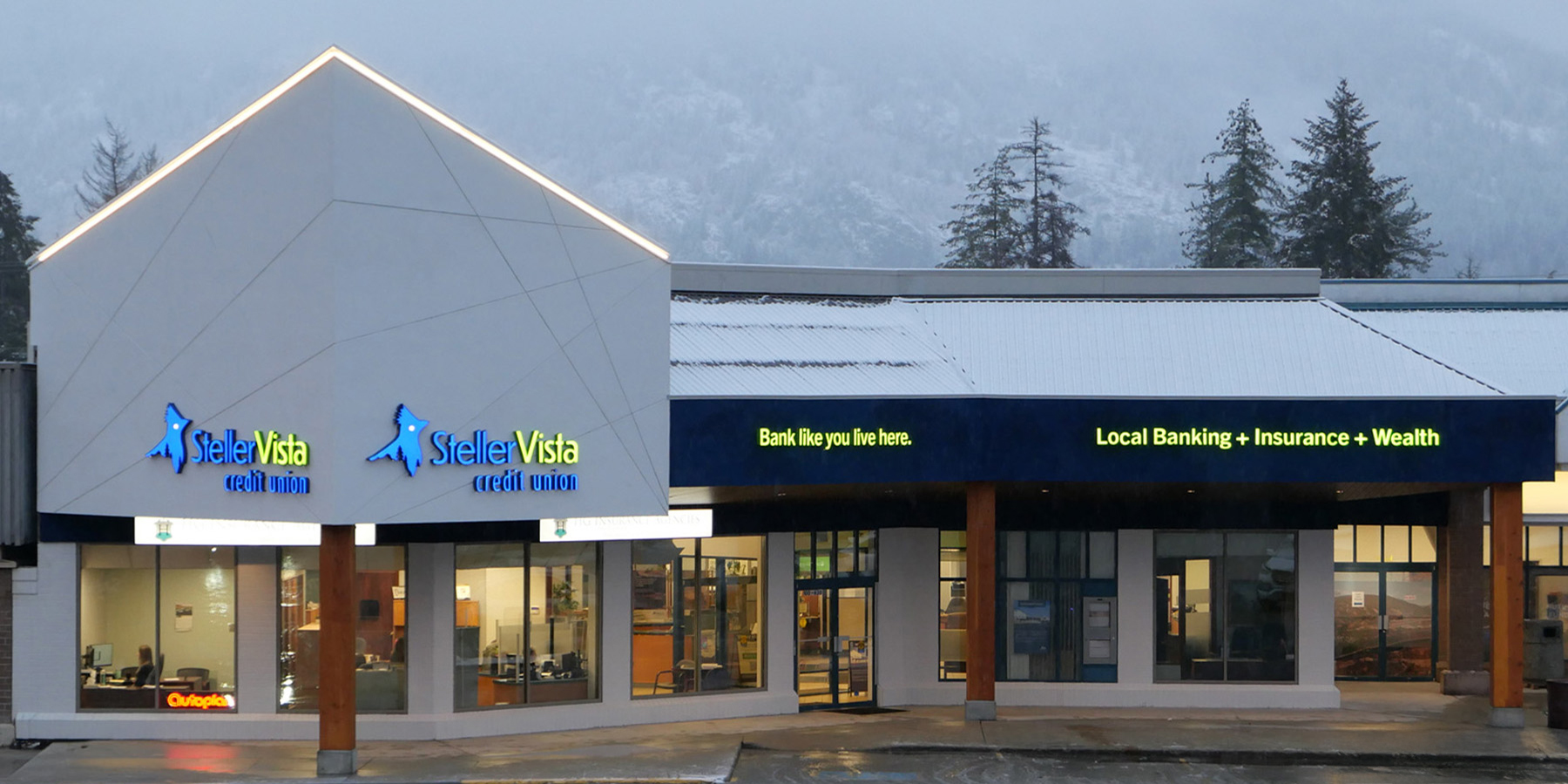 Exterior view of StellerVista Credit Union building with signage and windows.